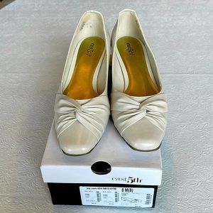 Bone-colored 1 inch heels.Size 8